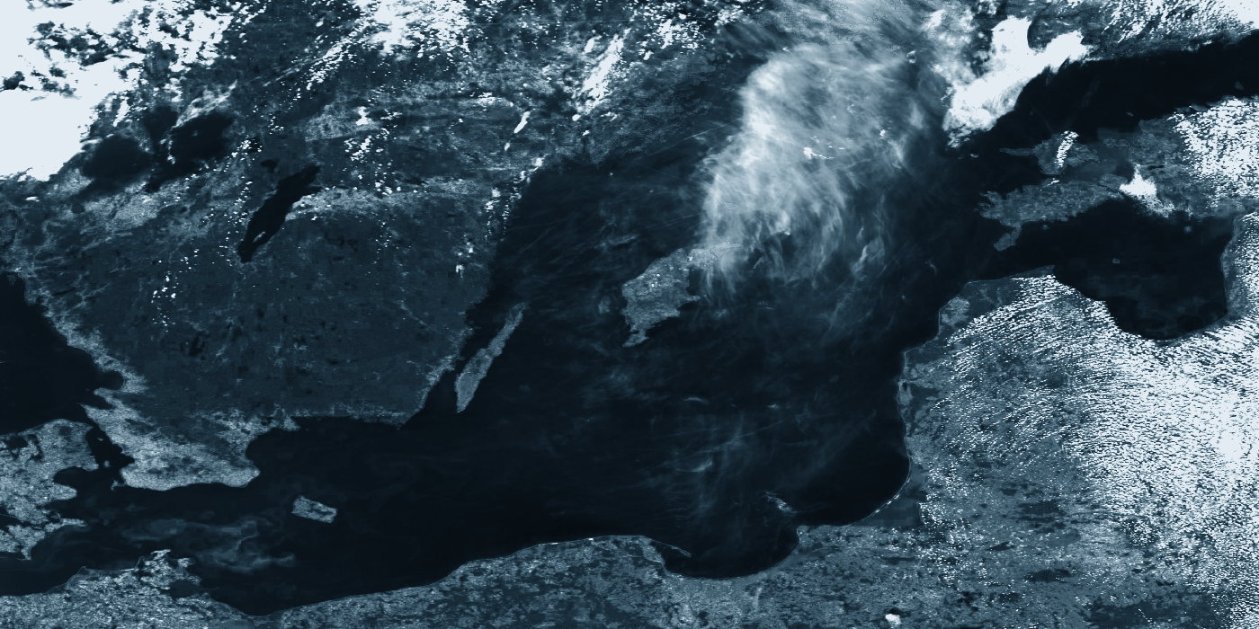 Monochrome satellite view of the Baltic Sea and Scandinavia, rendered in steel blue
